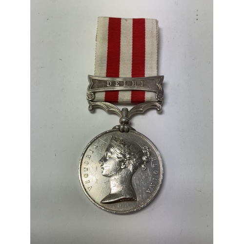 2212 - India Mutiny medal 1857-58 with Delhi Bar, marked to Sub Conducter, P.Pearson.