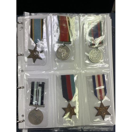 2232 - An album of WW2 and later medals 22 in total including miniatures and a set of John Player cigarette... 