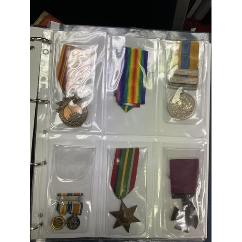2232 - An album of WW2 and later medals 22 in total including miniatures and a set of John Player cigarette... 