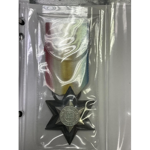 2232 - An album of WW2 and later medals 22 in total including miniatures and a set of John Player cigarette... 