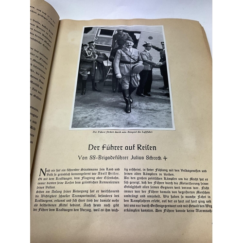 2233 - Adolf Hitler, a book about. Published in German with applied black and white photographs, dated 1936... 