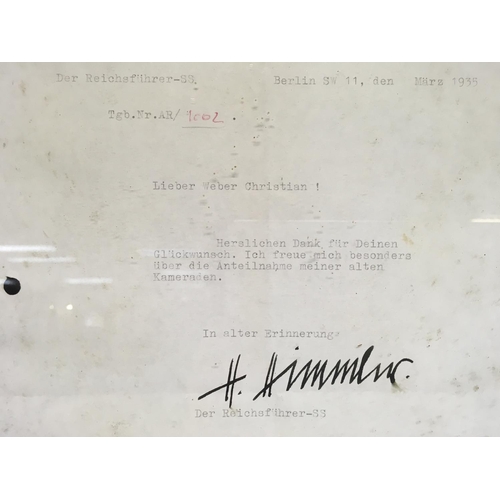 2235 - Framed WW2 document with Himmler signature. In fair condition