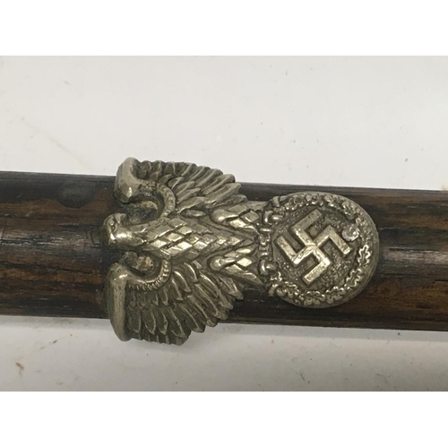 2236 - SS swagger stick, badge applied to the shaft and death head badge to pommel.
