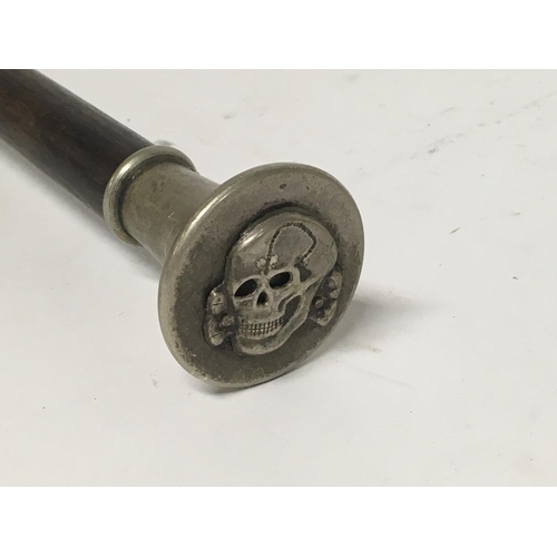2236 - SS swagger stick, badge applied to the shaft and death head badge to pommel.