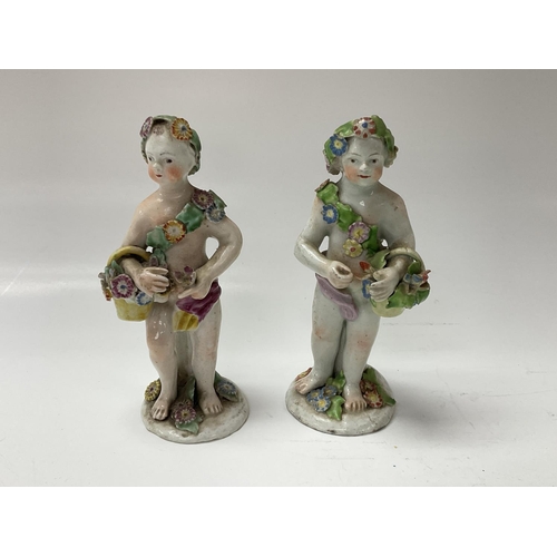 1019 - 2 18thC English porcelain figurines of cherubs, Possibly Bow. 13cm