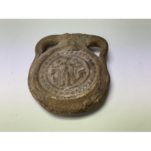 1020 - A small early terracotta amphora, perfume bottle. 9cm.