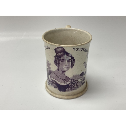 1021 - An Early Victorian commemorative Queen Elizabeth pottery tankard. 7cm.