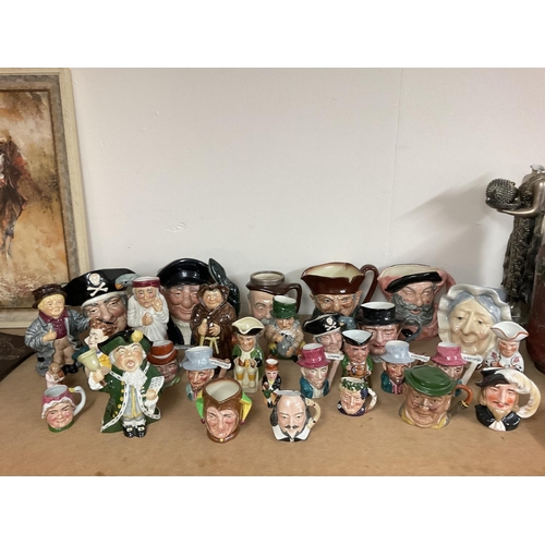 1031 - A collection of Doulton & Toby character jugs