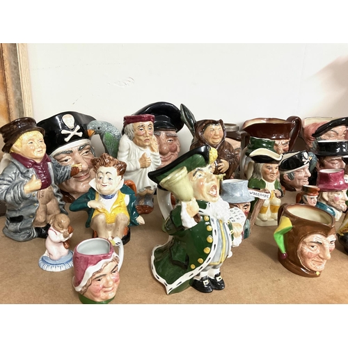 1031 - A collection of Doulton & Toby character jugs