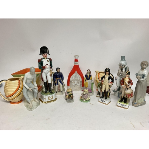 1039 - A various collection of ceramics including Beatrix Potter figures, Casades figures and Wade pottery