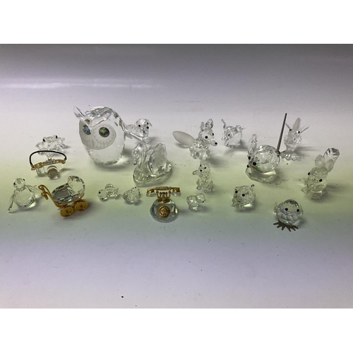 1075 - A collection of Swarovski Crystal figures etc.