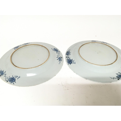 1121 - Two late 18th century Chinese Export blue and white plates decorated with flowers and bamboo diamete... 