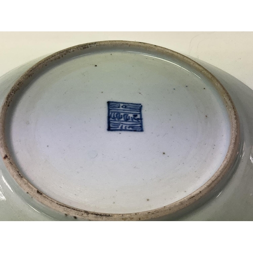 1137 - An early Chinese Canton decorated celadon dish, 21cm.