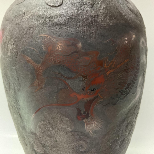 1147 - A large Japanese bronzed terracotta vase with dragon and cloud decoration. 47cm