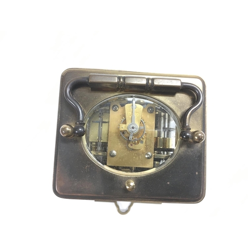 1207 - A French brass cased carriage clock, comes with key.