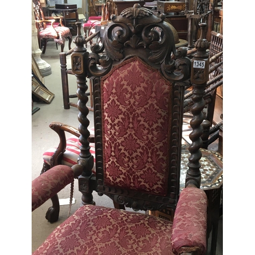 1251 - A quality Victorian carved oak open arm chair with barley twist supports. Height 132cm