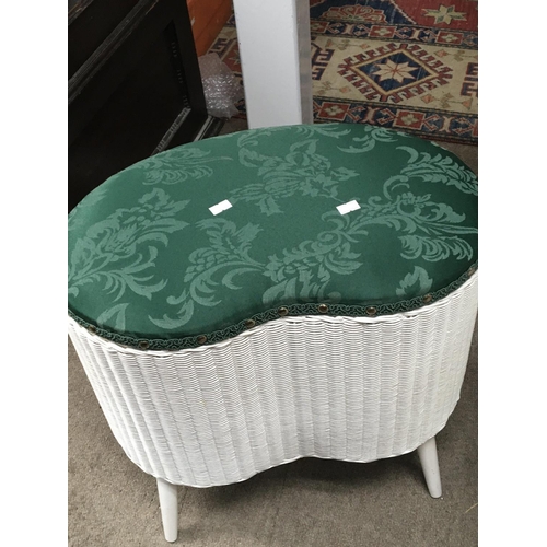 1296 - Two Lloyd loom linen baskets. With green upholstery.