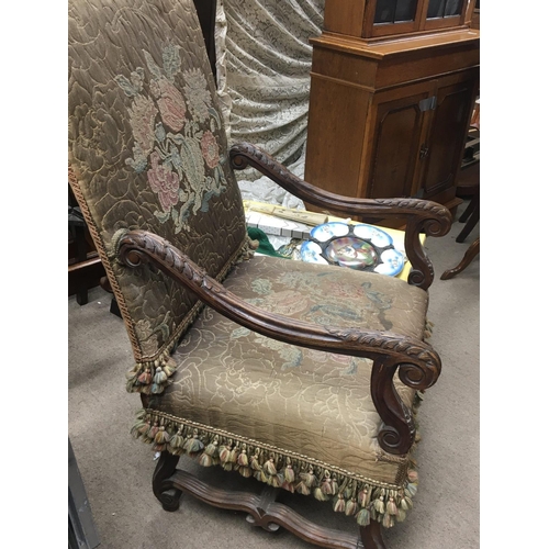 1324 - A Quality early 20th century carved walnut Continental open arm chair with an embroidered back and s... 