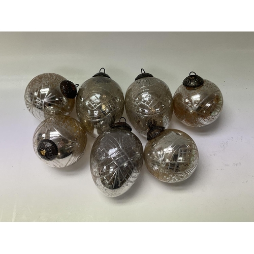 1976 - A collection of silvered and cut glass Christmas tree decorations.