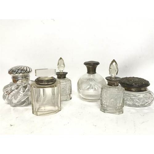 1980 - Glass + Silver bottles including scent bottles and a Dumpy bottle