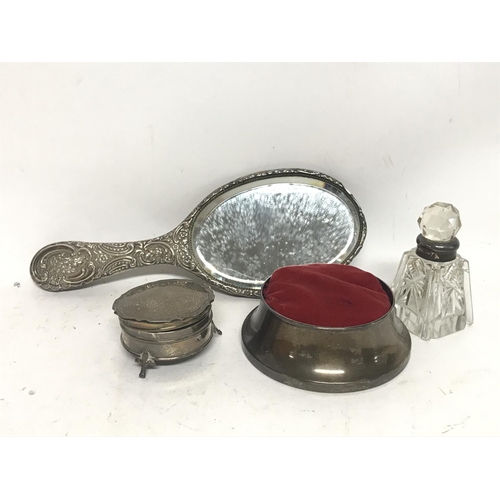 1981 - 4 x Silver items- Large Silver pin cushion, small Silver ring box, a small hand mirror and a glass b... 