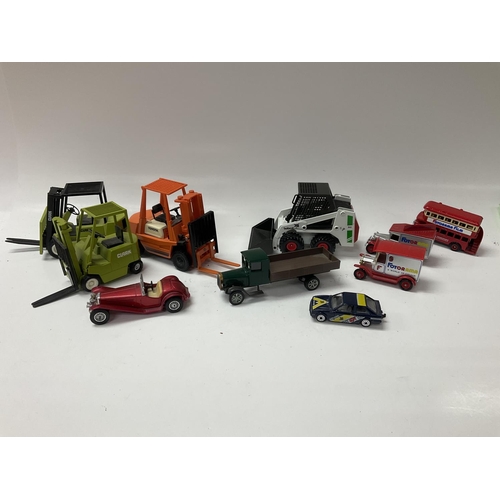 1984 - A small collection of die cast model trucks and cars.