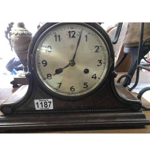 2007 - An Oak clock with silvered dial and Arabic numerals.