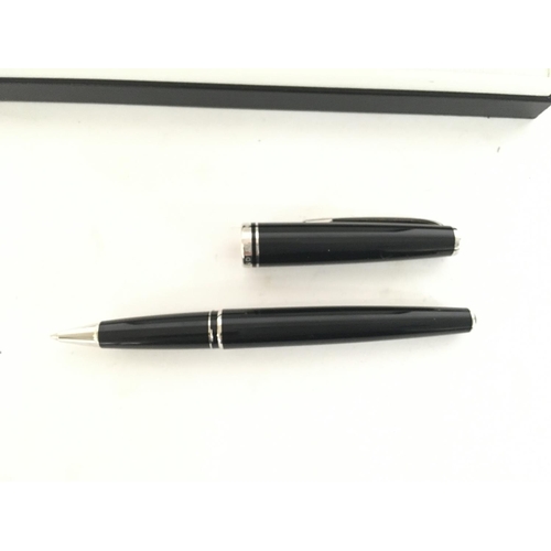 701 - A Boxed Mount Blanc Pen with service Guide.