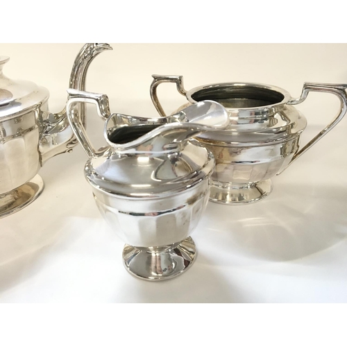 707 - Silver plated tea set and four goblets.