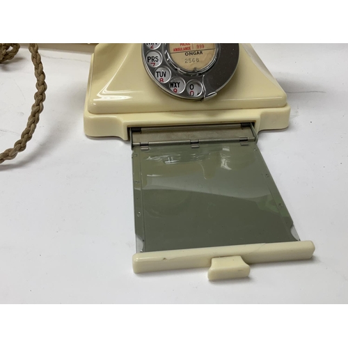 713 - A Vintage cream 232L model Bakelite phone with bell box.