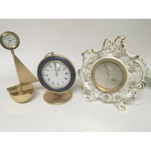 721 - A Coalport porcelain clock and two other modern design clock (3) NO RESERVE