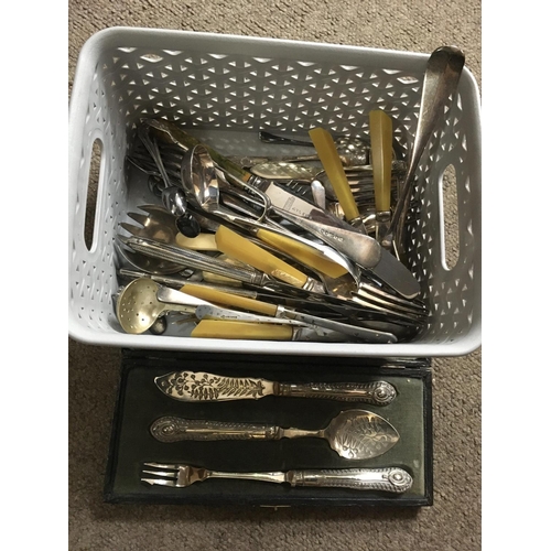 756 - A small silver serving spoon, together with two cased cutlery sets and a small quantity of cutlery