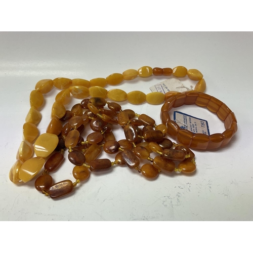 764 - 3 Amber bead jewellery items.