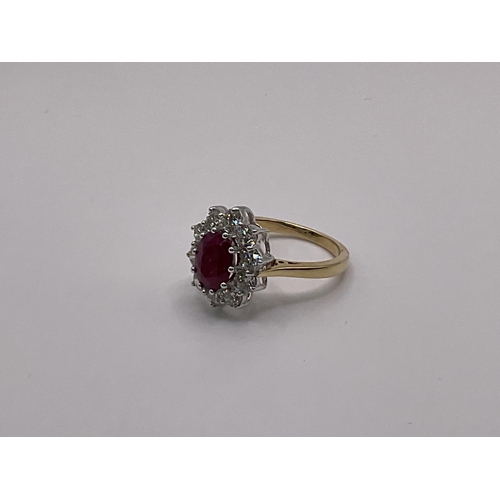 775 - A certified 18ct white and yellow gold oval cut ruby and diamond cluster ring, 1.50ct Ruby, 1.50ct D... 