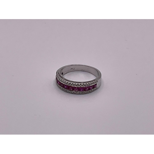 780 - An 18ct white gold ruby and diamond ring.