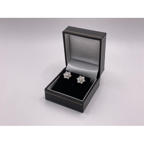 782 - A pair of 9ct gold diamond cluster stud earrings, approx 0.20ct.