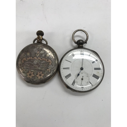 783 - A omega pocket watch with engraved case button wind together with a silver case
Pocket watch.