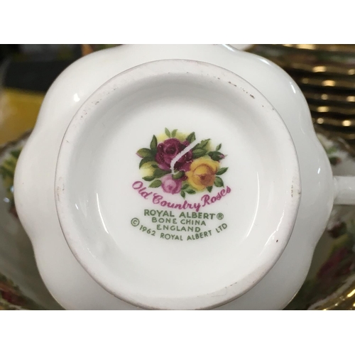 801 - Royal Albert Old Country Roses ceramic dinnerware including plates, teacups, egg cups and saucers. M... 