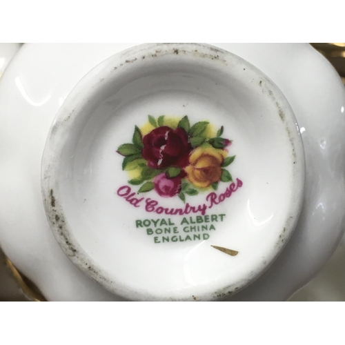 803 - Royal Albert Old Country Roses ceramic dinnerware including plates, teacups, egg cups and saucers. M... 