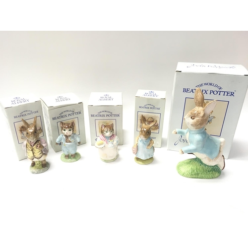 812 - A bunnykins Breakfast set and 4 Boxed Royal Albert Beatrix Potter Figures and a John Beswick.