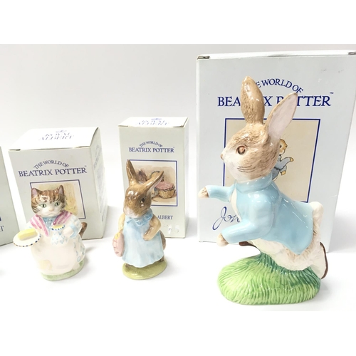 812 - A bunnykins Breakfast set and 4 Boxed Royal Albert Beatrix Potter Figures and a John Beswick.