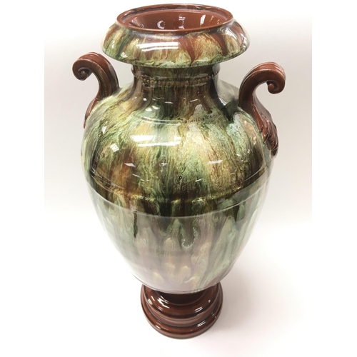 826 - A Drip Glazed Vase. Approximate height 40cm.