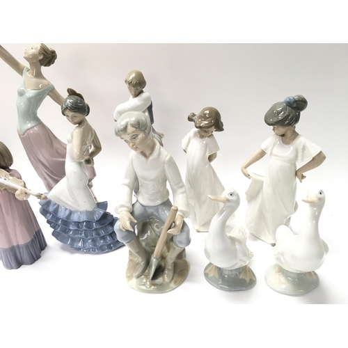 835 - A Collection of 9 Nao Figures.