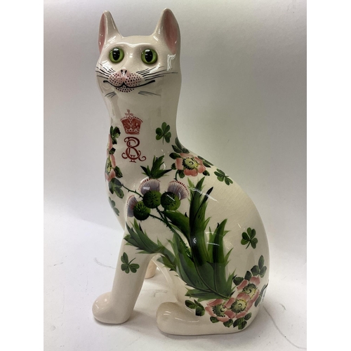 920 - A Wemyss Giselda pottery cat with floral decoration, made for the Queens Jubilee. 34cm.