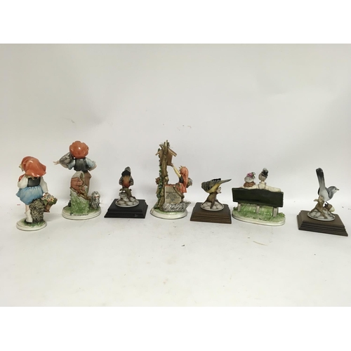 940 - Six boxed Royal Doulton ceramic figures