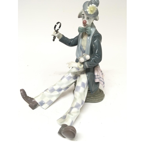 960 - A Lladro figure of a clown holding a magnifying glass with large watch height 25cm