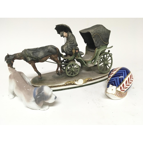 962 - A Capodimonte porcelain figure a Lladro dog a d a Royal Crown Derby porcelain snail (3) no damage.