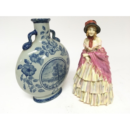 968 - A Minton porcelain blue and white moon flask signed base and early model Royal Doulton figure A Vict... 