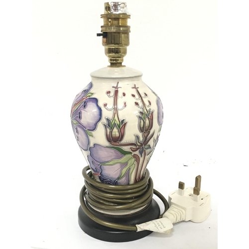 970 - A small Moorcroft lamp fitted for electric high 26cm