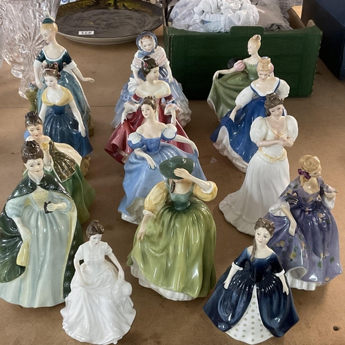 975 - 14 Royal Doulton lady figurines, various sizes, all in good condition.